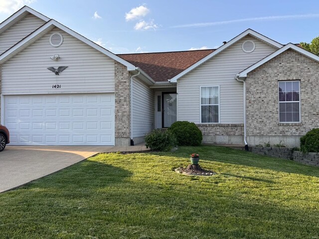 single story home featuring driveway, a front yard, a garage, brick siding, and a shingled roof
