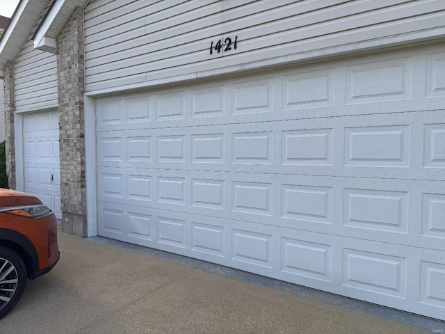 garage with driveway