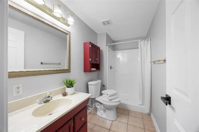 bathroom with tile patterned flooring, visible vents, toilet, vanity, and a stall shower