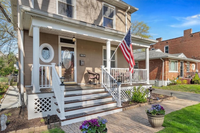 entrance to property with a porch