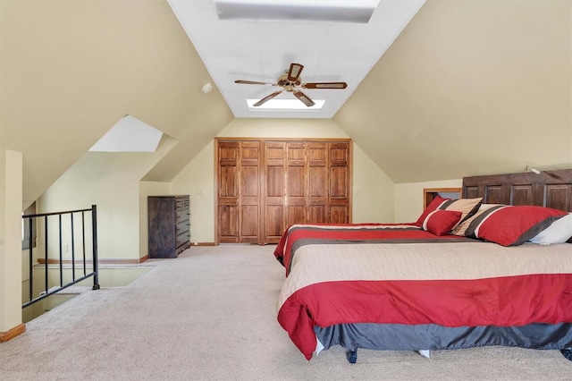 bedroom with ceiling fan, lofted ceiling, carpet flooring, and baseboards