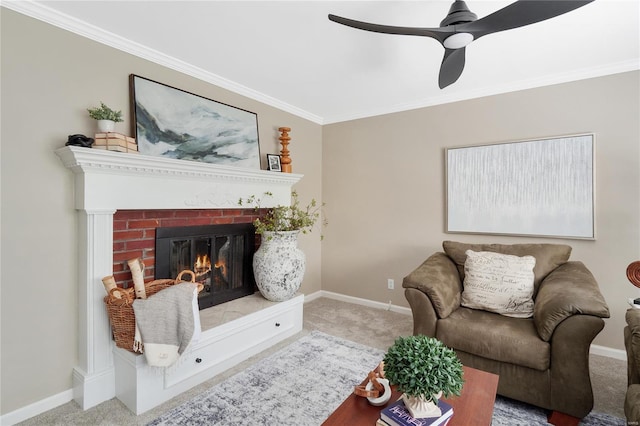 living room with crown molding, baseboards, carpet, and a fireplace