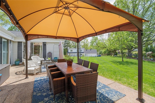 view of patio / terrace featuring a gazebo and outdoor dining space