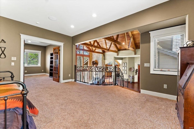 interior space with carpet floors, recessed lighting, and baseboards