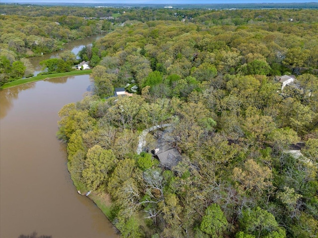 bird's eye view featuring a water view and a forest view