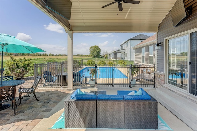 view of patio / terrace featuring outdoor lounge area, a ceiling fan, outdoor dining area, and fence