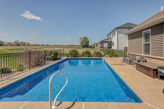 view of swimming pool featuring a fenced in pool and a fenced backyard