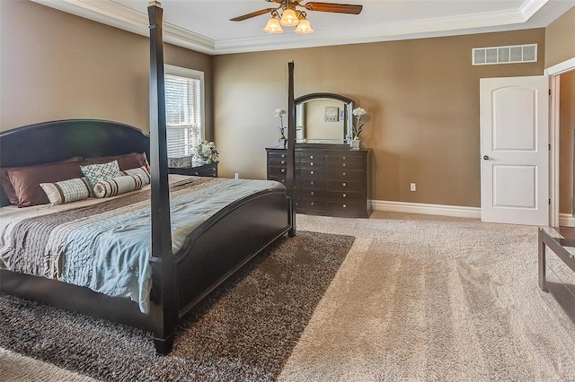 bedroom with carpet, visible vents, ornamental molding, baseboards, and ceiling fan