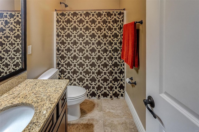 full bathroom featuring tile patterned flooring, toilet, vanity, and curtained shower