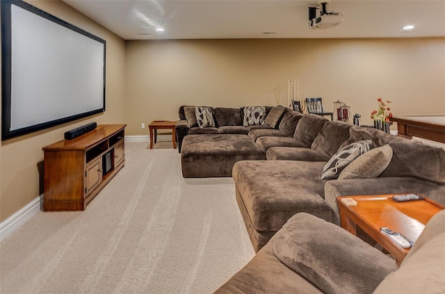 home theater room featuring recessed lighting, baseboards, and light colored carpet