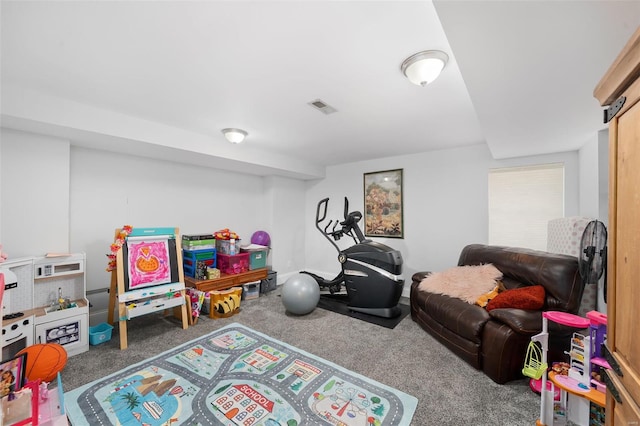 recreation room with visible vents and carpet
