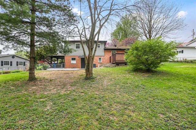 view of yard with a deck