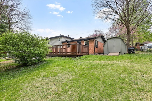 view of yard with an outdoor structure, a deck, and a storage shed