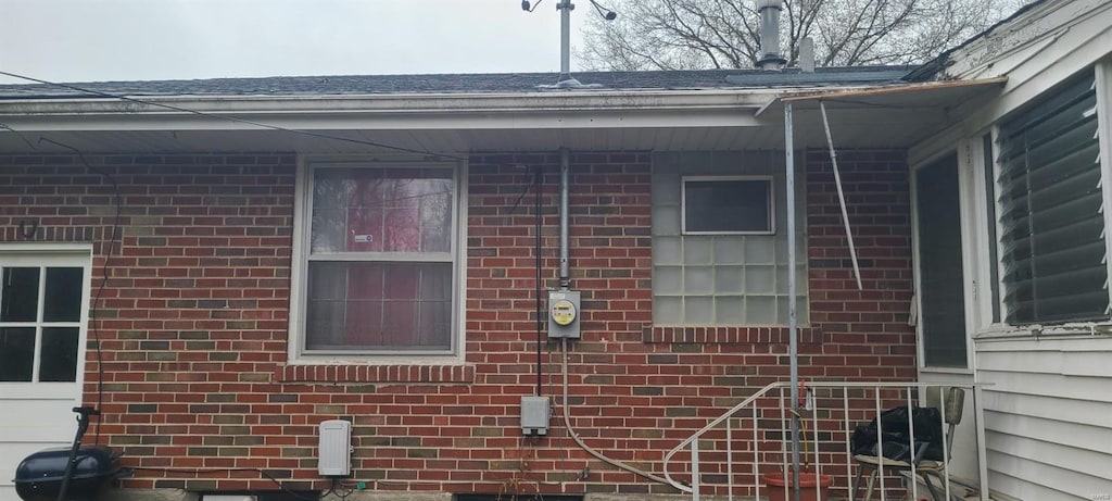 view of home's exterior featuring brick siding