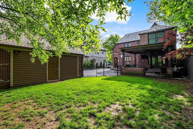 view of yard with fence and a patio