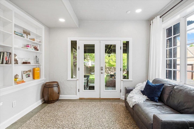 entryway with french doors, recessed lighting, baseboards, and a wealth of natural light