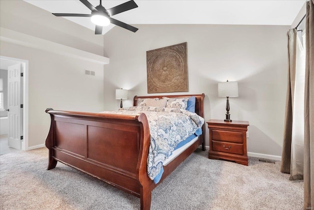 bedroom featuring a ceiling fan, visible vents, baseboards, light colored carpet, and lofted ceiling