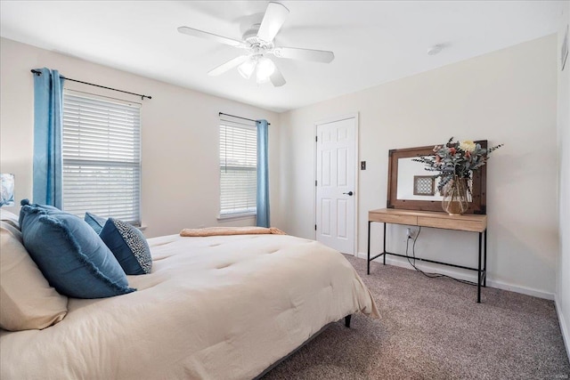 bedroom featuring ceiling fan, baseboards, and carpet floors