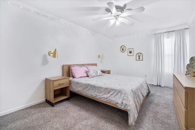 bedroom featuring baseboards, ceiling fan, and light colored carpet