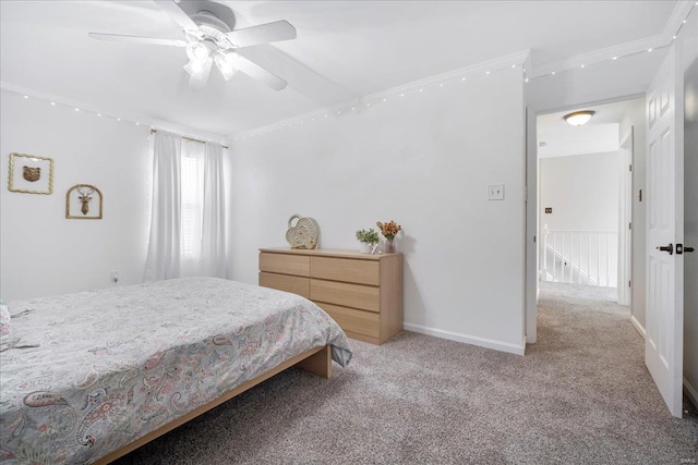 bedroom with a ceiling fan, crown molding, and carpet