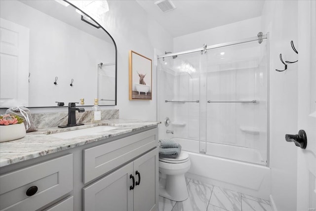 full bath featuring marble finish floor, toilet, vanity, visible vents, and bath / shower combo with glass door