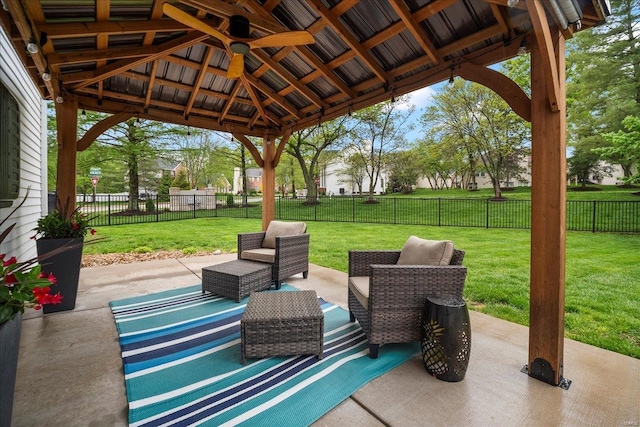 view of patio / terrace featuring a gazebo, ceiling fan, and a fenced backyard