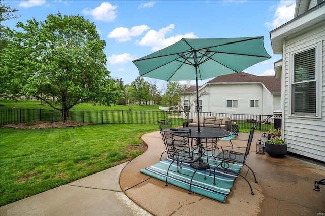 view of patio / terrace with outdoor dining area and a fenced backyard