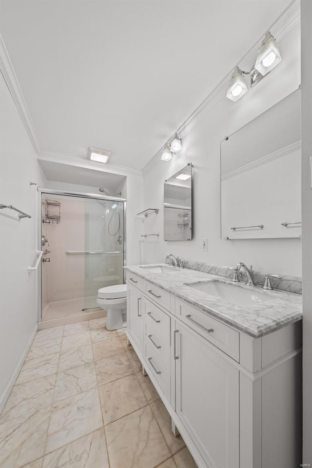 bathroom featuring a shower stall, crown molding, marble finish floor, and a sink