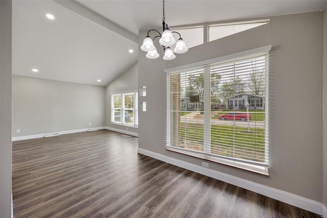 unfurnished dining area featuring a chandelier, dark wood-type flooring, high vaulted ceiling, and baseboards