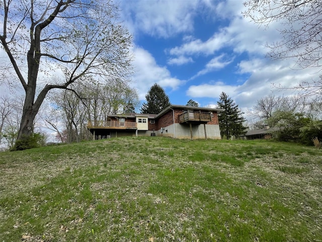 view of yard with a wooden deck