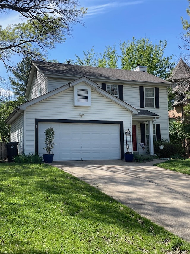traditional-style home with an attached garage, driveway, a chimney, and a front yard