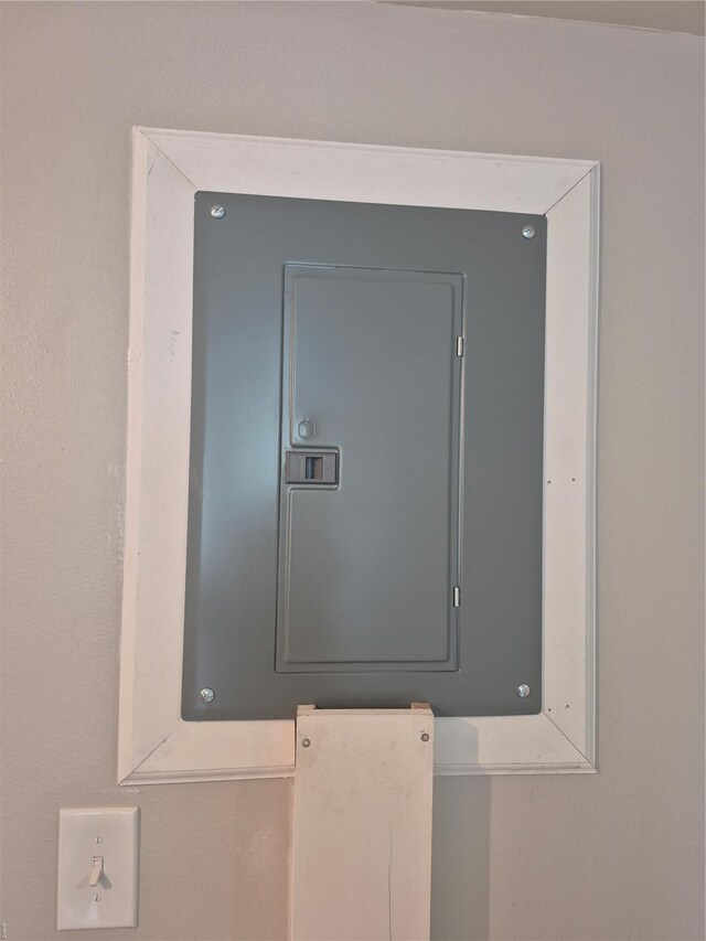 utility room featuring electric panel