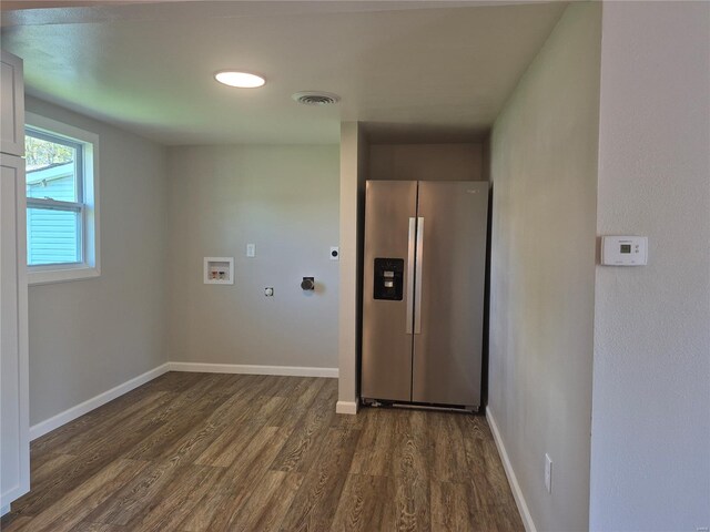 laundry area featuring hookup for a washing machine, hookup for an electric dryer, baseboards, dark wood-type flooring, and laundry area