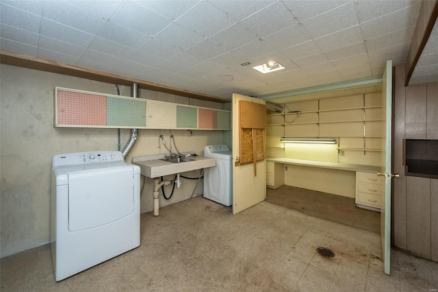 clothes washing area featuring laundry area, washer hookup, and light floors