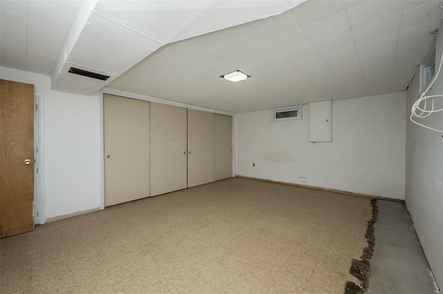 finished basement with visible vents and light floors
