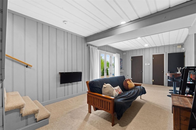 living room with recessed lighting and light colored carpet
