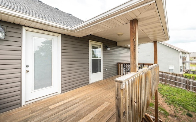 wooden deck featuring fence