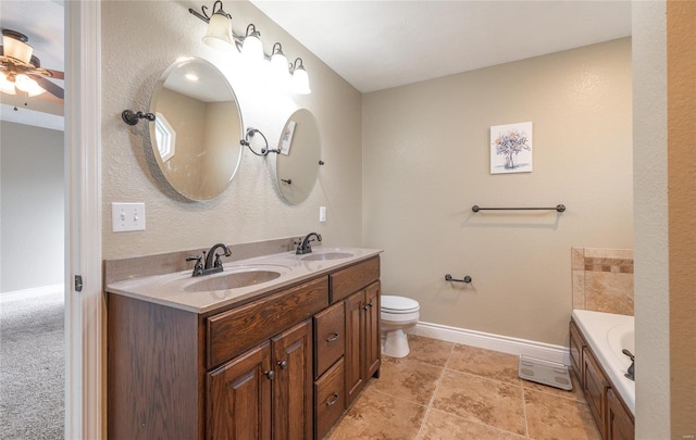 full bath featuring baseboards, a sink, ceiling fan, and double vanity