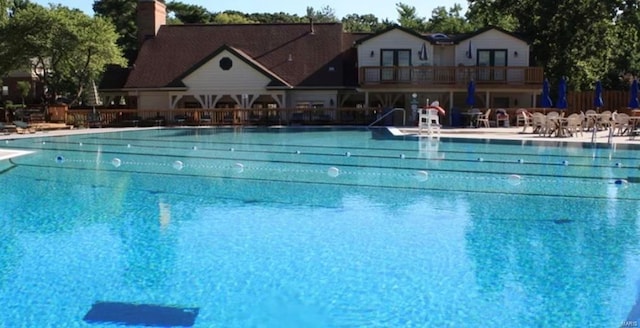 pool with a patio area