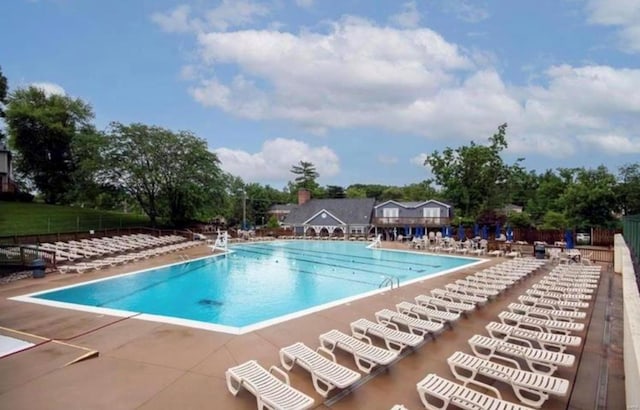 pool featuring a patio area