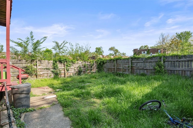 view of yard featuring a fenced backyard