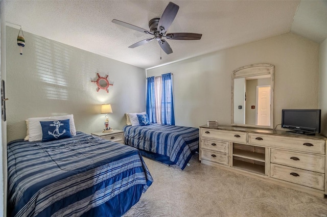 carpeted bedroom featuring a ceiling fan