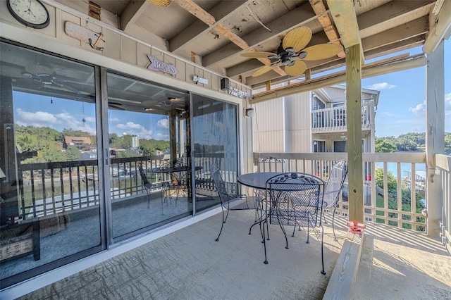 balcony featuring a ceiling fan