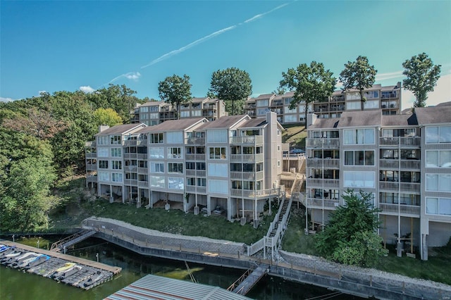 view of property with a water view