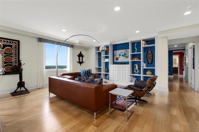 living area featuring recessed lighting, baseboards, ornamental molding, and light wood-type flooring