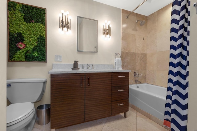 bathroom with vanity, tile patterned flooring, shower / bath combo with shower curtain, and toilet