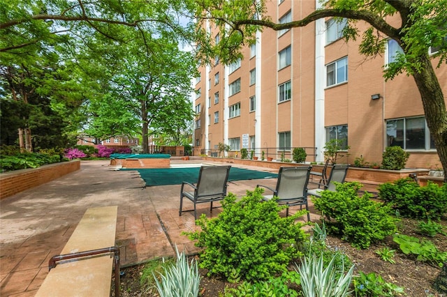 view of pool with a patio