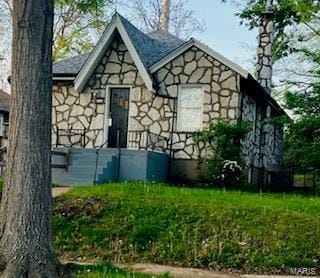 view of property exterior featuring stone siding