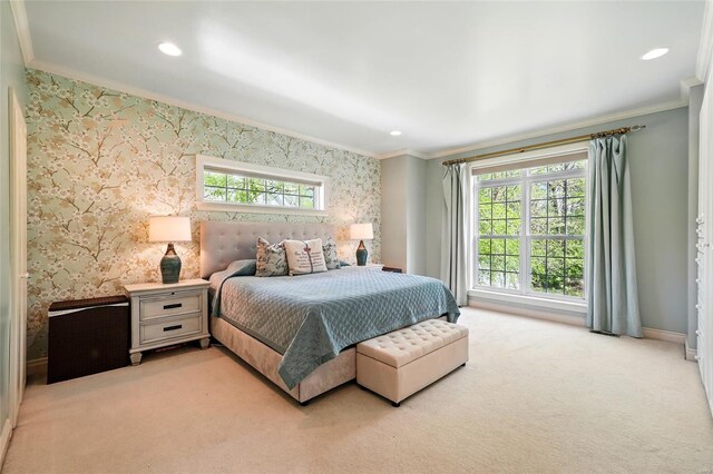 bedroom featuring wallpapered walls, baseboards, ornamental molding, and light colored carpet