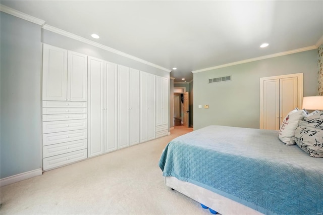 bedroom with recessed lighting, visible vents, ornamental molding, baseboards, and light colored carpet